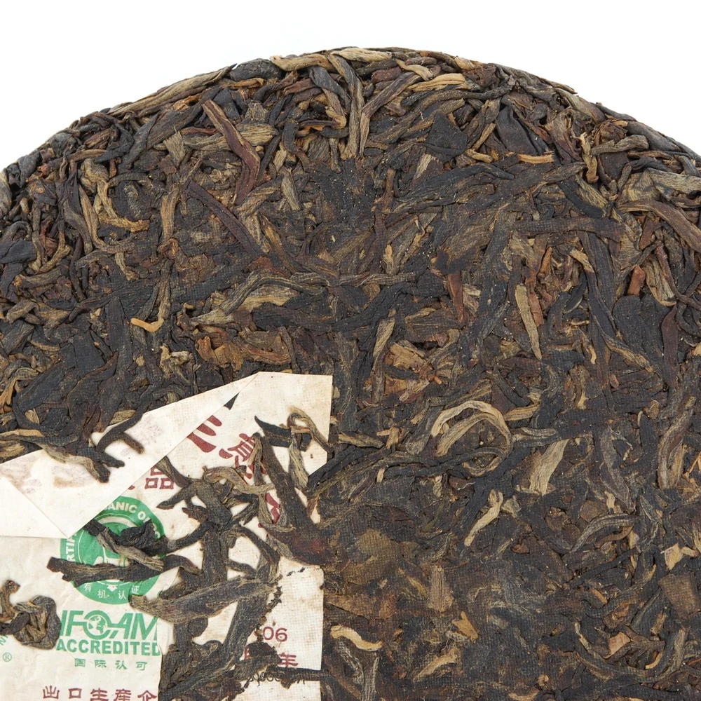 2006 Six Famous Tea Mountain, Organic Ban Zhang Tea Cake, Diancang Pin (Raw/Sheng)€31.95Pu-erh TeamySiteTEAWAVYTEAWAVY